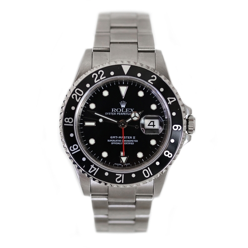 81 - ROLEX GMT MASTER II REFERENCE 16710 CIRCA 2002, circular gloss black dial with applied hour markers,... 