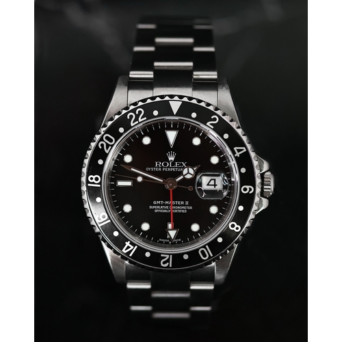 81 - ROLEX GMT MASTER II REFERENCE 16710 CIRCA 2002, circular gloss black dial with applied hour markers,... 