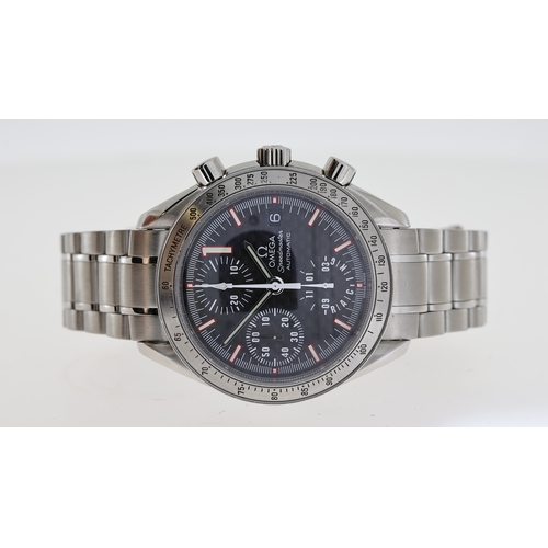 26 - OMEGA SPEEDMASTER RACING MICHAEL SCHUMACHER BOX AND PAPERS 2005, circular carbon dial with baton hou... 