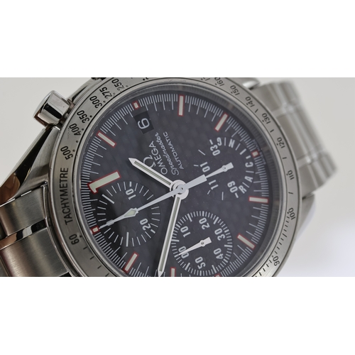 26 - OMEGA SPEEDMASTER RACING MICHAEL SCHUMACHER BOX AND PAPERS 2005, circular carbon dial with baton hou... 