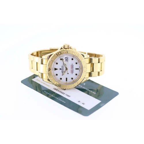 29 - 18CT ROLEX YACTHMASTER 40 REFERENCE 16628 WITH ROLEX SERVICE, circular white dial with applied hour ... 