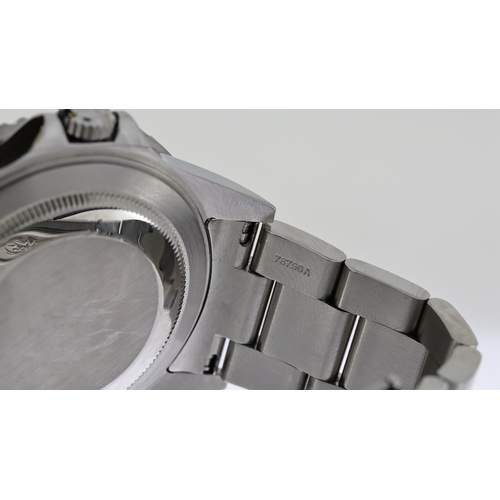 38 - ROLEX GMT MASTER II REFERENCE 16710 CIRCA 2001, circular gloss black dial with applied hour markers,... 