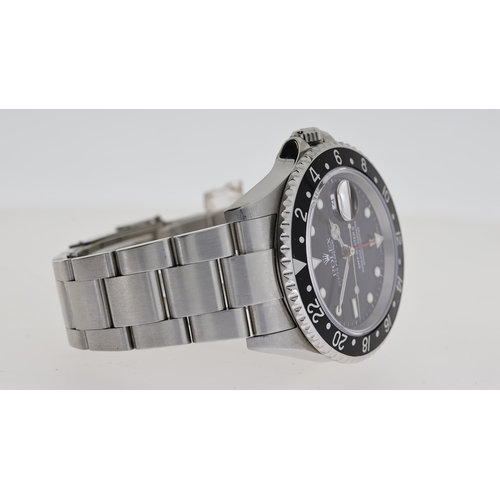 38 - ROLEX GMT MASTER II REFERENCE 16710 CIRCA 2001, circular gloss black dial with applied hour markers,... 