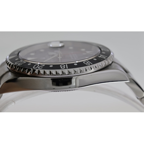 38 - ROLEX GMT MASTER II REFERENCE 16710 CIRCA 2001, circular gloss black dial with applied hour markers,... 