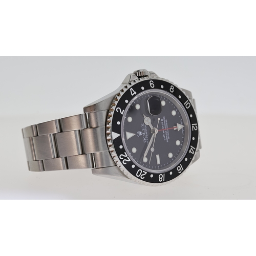 38 - ROLEX GMT MASTER II REFERENCE 16710 CIRCA 2001, circular gloss black dial with applied hour markers,... 