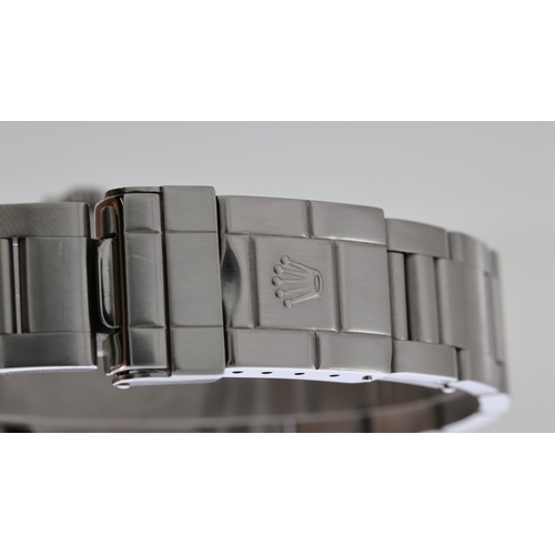 38 - ROLEX GMT MASTER II REFERENCE 16710 CIRCA 2001, circular gloss black dial with applied hour markers,... 