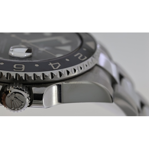 39 - ROLEX GMT MASTER II REFERENCE 116710, circular gloss black dial with applied hour markers, mercedes ... 