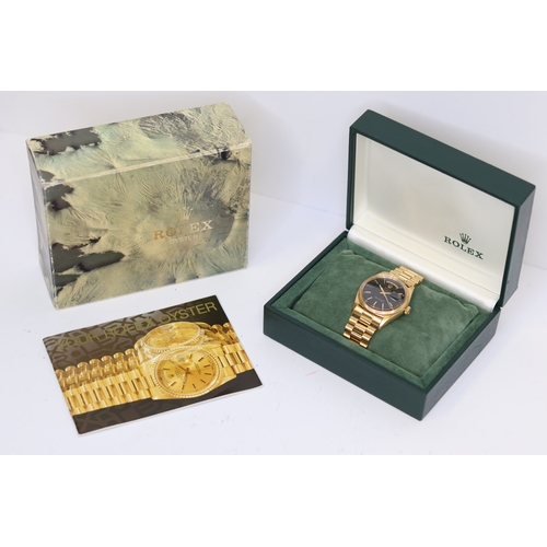 13 - RARE 18CT ROLEX DAY DATE 6611B CIRCA 1959, WITH BOX circular black dial with gold baton hour markers... 