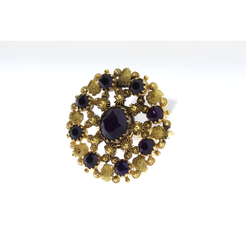 1007 - Antique Purple Stone Set Panel Ring, circular design with closed back settings, in yellow metal