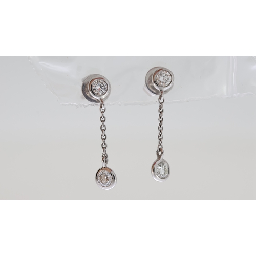 1028 - 18ct Diamond Drop Earrings, 2 feature Brilliant cut diamonds, fine trace link chain, 18ct white gold... 