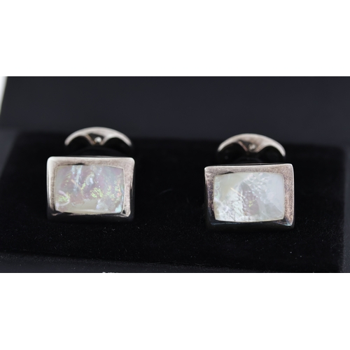 1034 - Silver mother of pearl cufflinks, boxed