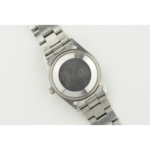 228 - ROLEX OYSTER PERPETUAL DATE REF. 15000 CIRCA 1982, circular silver dial with hour markers and hands,... 