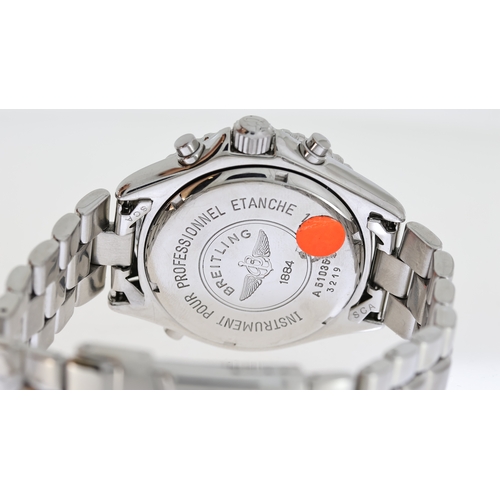 281 - BREITLING INTRUDER REVEIL REFERENCE A51035, circular sunburst grey dial with arabic numeral hour mar... 