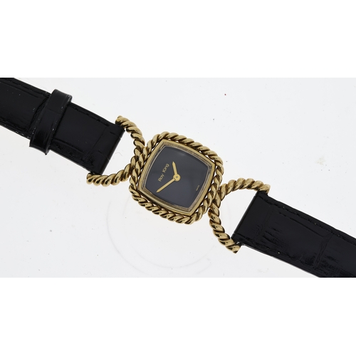 307 - 9CT ROY KING MECHANICAL WRISTWATCH CIRCA 1970's, oval black dial, 9ct rope case, aprox 21.5mm, black... 