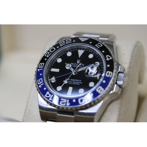 72 - ROLEX GMT MASTER II 'BATMAN' REFERENCE 116710BLNR BOX AND PAPERS 2015, circular black dial with gold... 