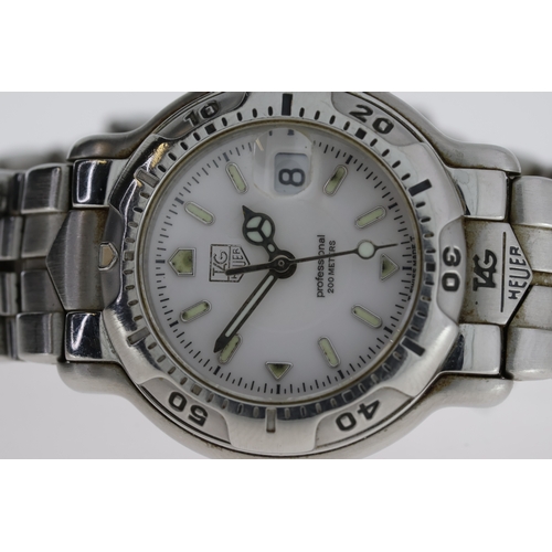 78 - TAG HEUER LADIES PROFESSIONAL REFERENCE WH1311, white dial,luminour hourmarkers, rotating bezel, 29m... 