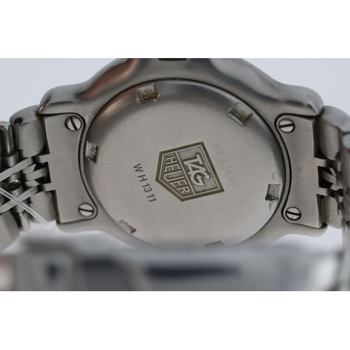 78 - TAG HEUER LADIES PROFESSIONAL REFERENCE WH1311, white dial,luminour hourmarkers, rotating bezel, 29m... 