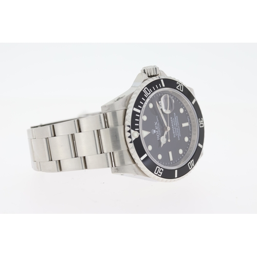 121 - ROLEX SUBMARINER REFERENCE 16610 CIRCA 2007, circular black dial with applied hour markers, mercedes... 