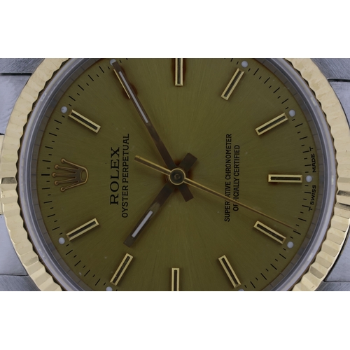 131 - ROLEX OYSTER PERPETUAL REFERENCE 14233 CIRCA 1994, circular champagne dial with baton hour markers, ... 