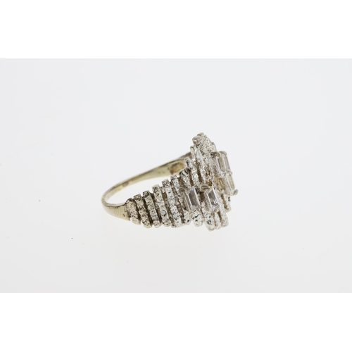 1044 - Vintage modernist white metal and spinel ring. Set in white metal with baguette cut spinels . The he... 