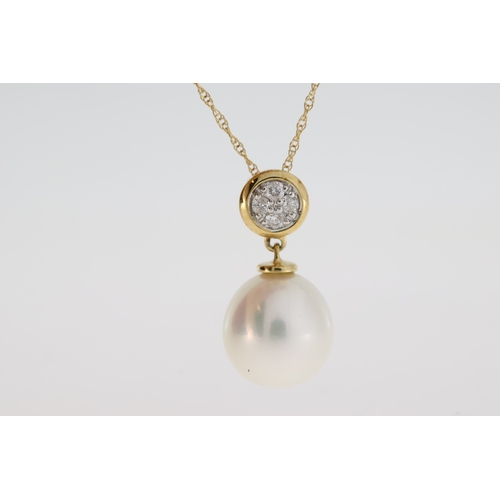 1066 - 9k yellow gold pearl and diamond bale necklace. Diamonds 0.08ct