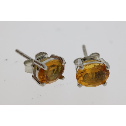 1074 - Pair of citrine studs in silver