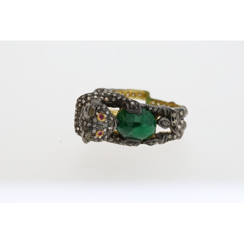 1087 - Unusual silver gilt panther ring heavily-set with diamonds. The panther is holding an oval emerald a... 