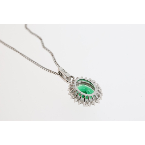 1090 - Silver necklace comprising oval green CZ with white CZ halo pendant and chain