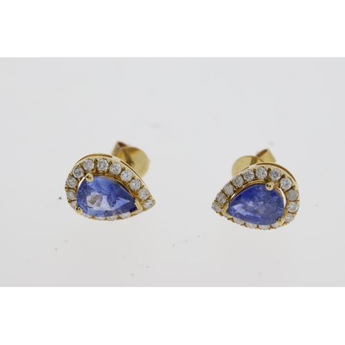 1097 - Pear shaped halo sapphire and diamond earrings. Marked 585. Length 1cm