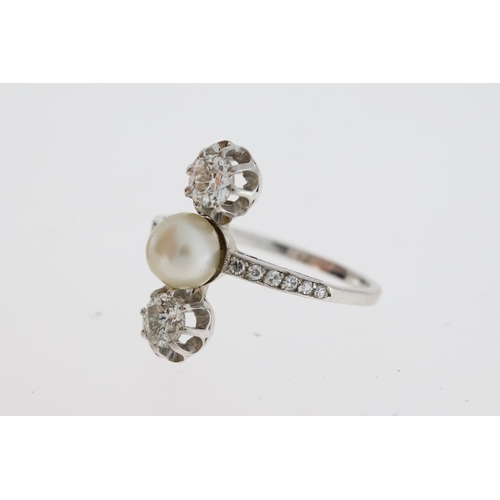 1107 - An art deco platinum trilogy ring comprising anatural pearl set between two old cut diamonds.Decorat... 