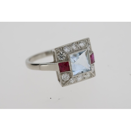 1109 - A platinum Aquamarine, ruby and diamond dressring measuring approximately 1.3 x 1.3mm.Aqua 1.30 cara... 