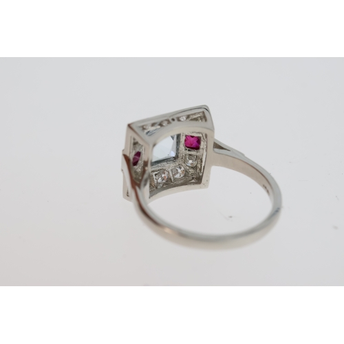 1109 - A platinum Aquamarine, ruby and diamond dressring measuring approximately 1.3 x 1.3mm.Aqua 1.30 cara... 