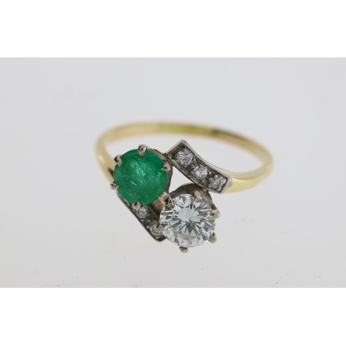 1112 - Vintage emerald and diamond cross over ring inwhite and yellow metal (no marks present)