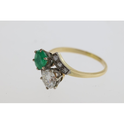 1112 - Vintage emerald and diamond cross over ring inwhite and yellow metal (no marks present)