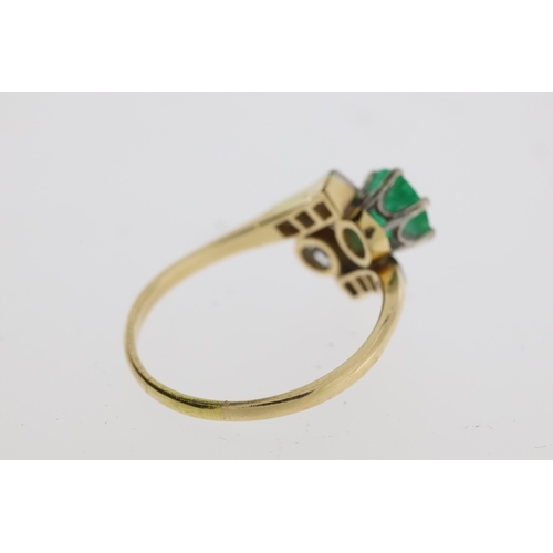 1112 - Vintage emerald and diamond cross over ring inwhite and yellow metal (no marks present)