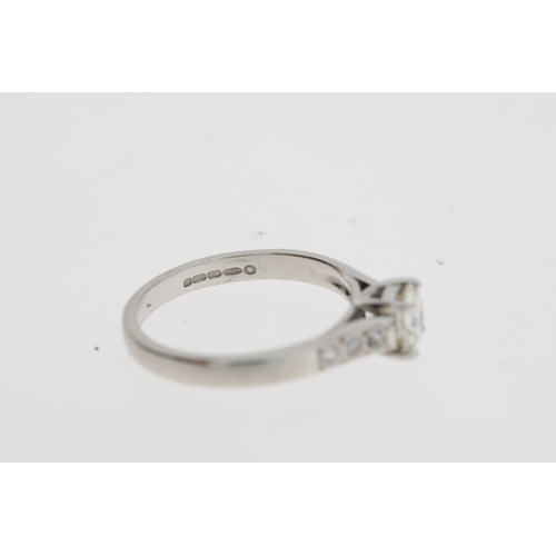 1113 - A Birmingham hallmark for 18 carat gold is
stamped inside this diamond solitaire ring. The
round dia... 