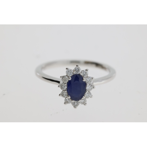 1116 - An oval sapphire and diamond ring.
Sapphire 0.56 carats, diamonds total 0.22 carats
18 carat white g... 