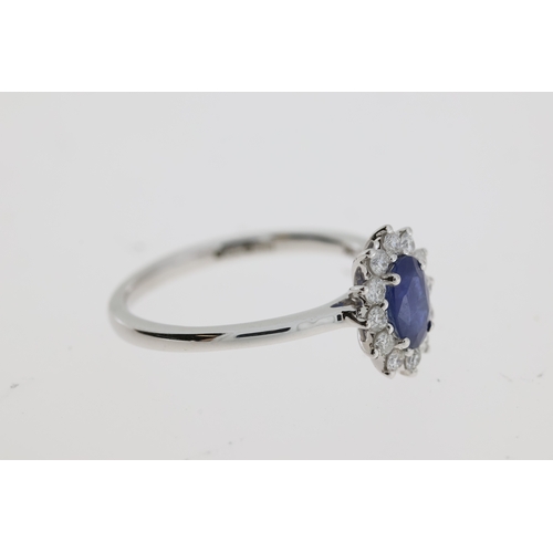 1116 - An oval sapphire and diamond ring.
Sapphire 0.56 carats, diamonds total 0.22 carats
18 carat white g... 