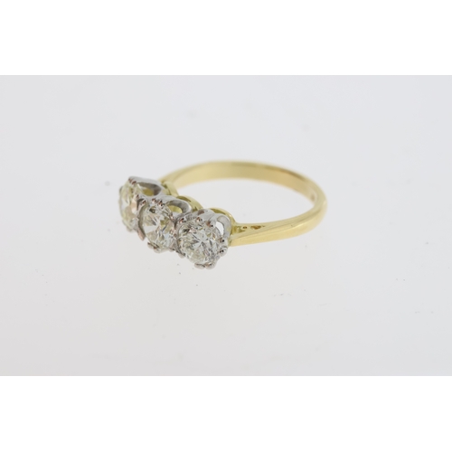 1118 - A round brilliant diamond 3 stone ring, the
diamond total is estimated at 2 carats. Stamped
18CT and... 