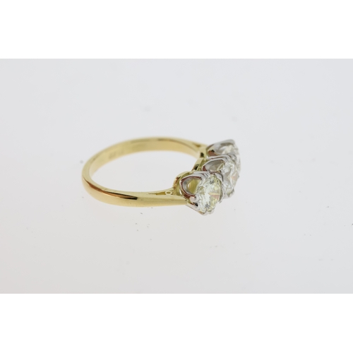 1118 - A round brilliant diamond 3 stone ring, the
diamond total is estimated at 2 carats. Stamped
18CT and... 