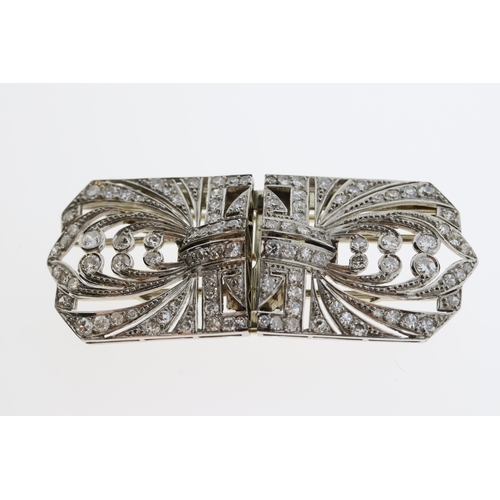 1120 - A French marked platinum double clip brooch
5.5cm x 2.5cm. Held together on an 18 carat
gold T frame... 