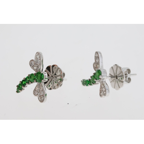 1121 - Pretty green garnet dragonfly earrings. Six
graduated garnet gemstones make up the body,
the wings b... 