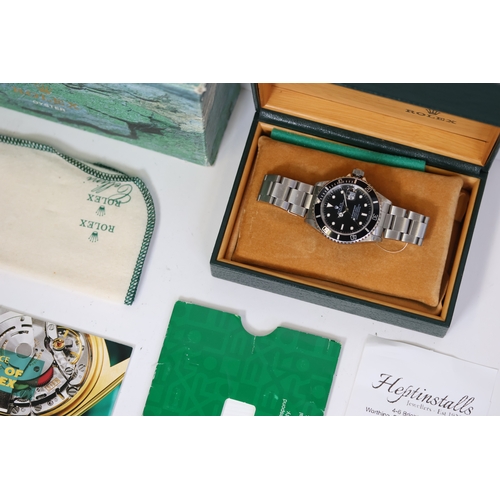 26 - ROLEX SUBMARINER DATE REFERENCE 16610 BOX AND RECENT SERVICE CIRCA 1997, circular black tritium dial... 