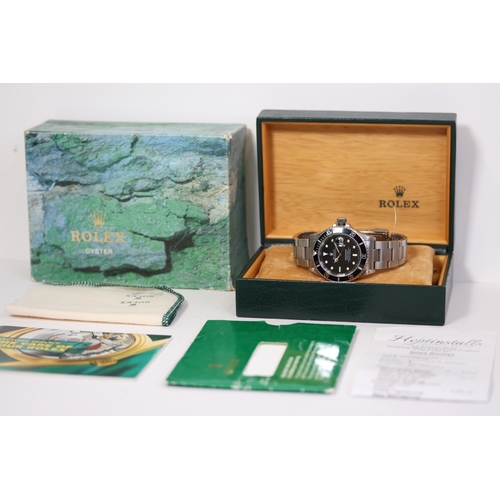 26 - ROLEX SUBMARINER DATE REFERENCE 16610 BOX AND RECENT SERVICE CIRCA 1997, circular black tritium dial... 