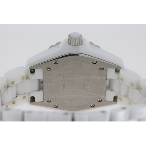 27 - CHANEL J12 QUARTZ WATCH W/BOX AND PAPERS 2006. Approx 34mm white ceramic case with a screw down case... 