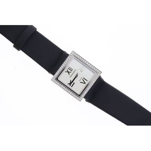 36 - 18CT LADIES TIFFANY & CO ATLAS DIAMOND SET WITH BOX, square silver dial with applied roman numeral h... 