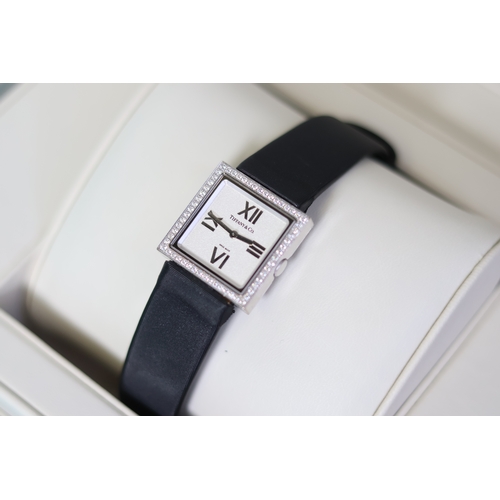36 - 18CT LADIES TIFFANY & CO ATLAS DIAMOND SET WITH BOX, square silver dial with applied roman numeral h... 