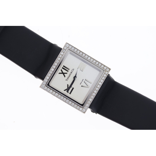 36 - 18CT LADIES TIFFANY & CO ATLAS DIAMOND SET WITH BOX, square silver dial with applied roman numeral h... 