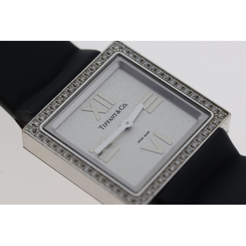 36 - 18CT LADIES TIFFANY & CO ATLAS DIAMOND SET WITH BOX, square silver dial with applied roman numeral h... 