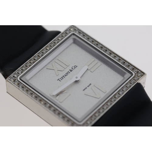 36 - 18CT LADIES TIFFANY & CO ATLAS DIAMOND SET WITH BOX, square silver dial with applied roman numeral h... 
